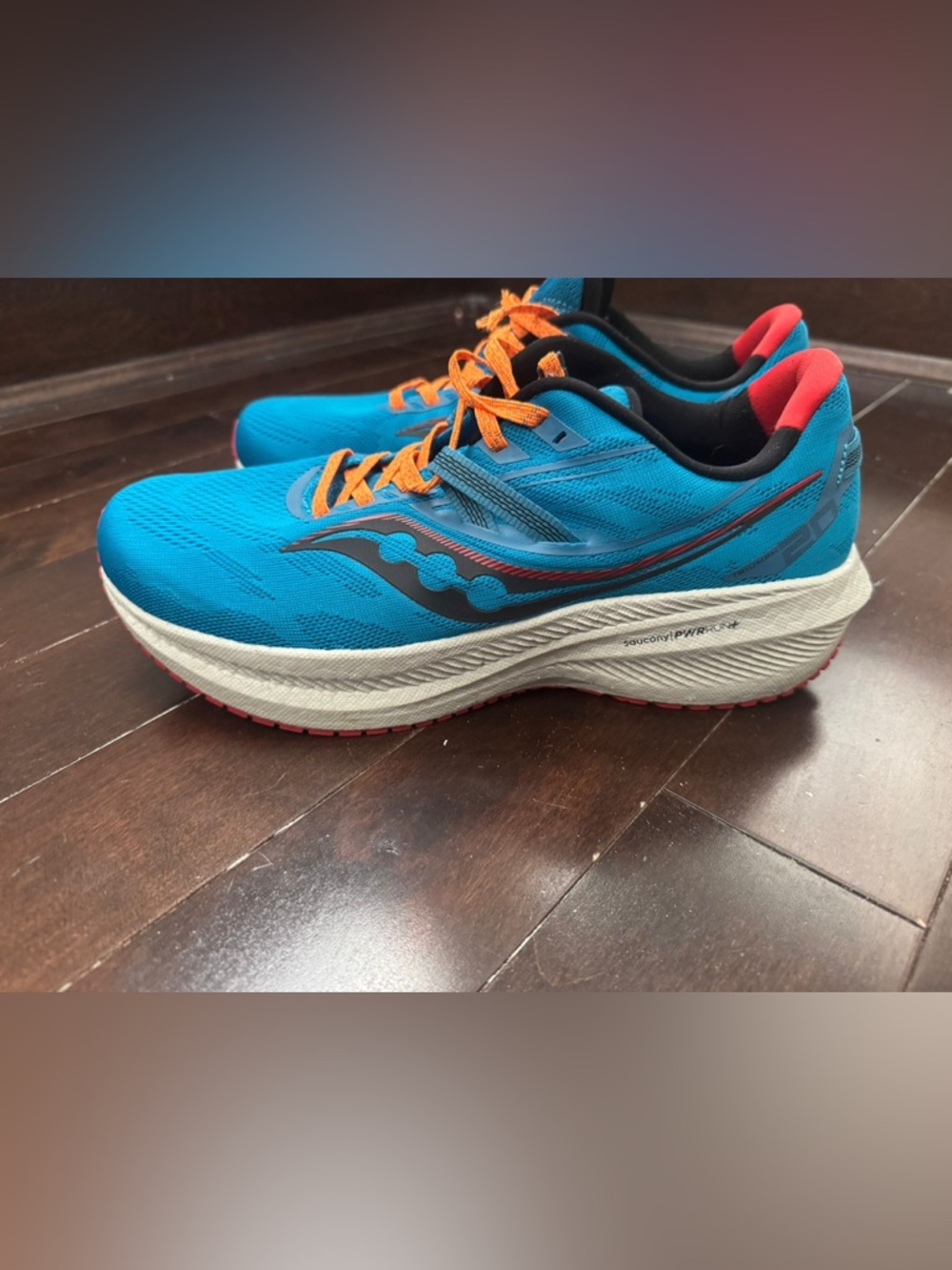 Saucony Men’s Teal Athletic Shoes with Orange and Coral Details